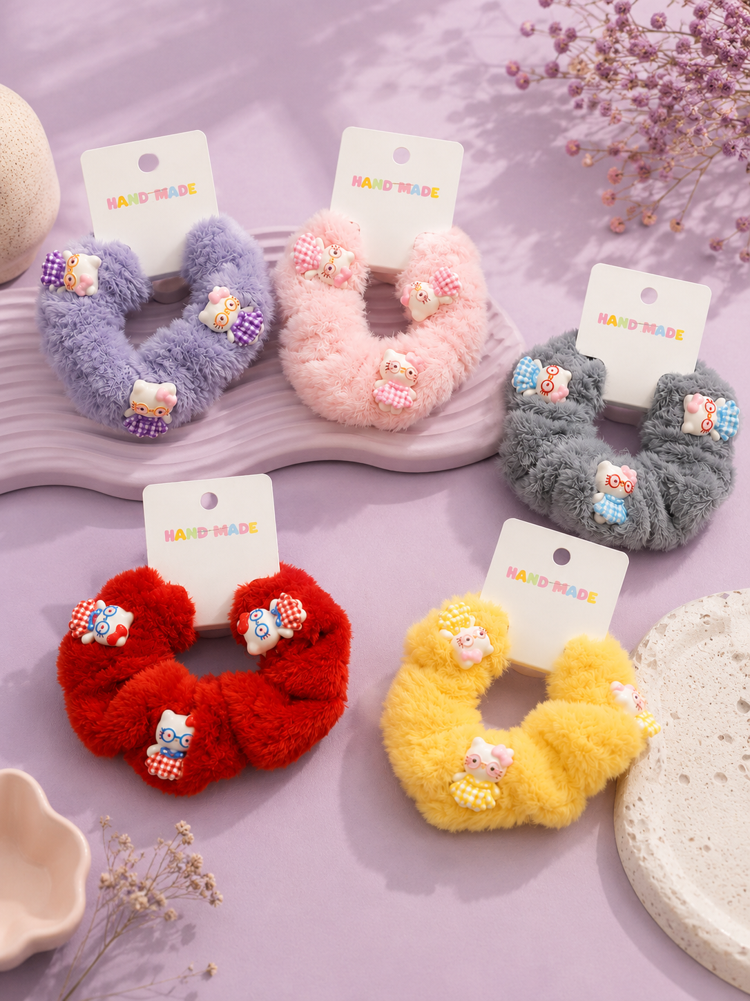 Cola de peluche hello kitty