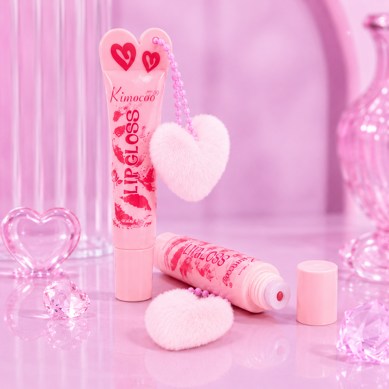Lip gloss pompón de corazón rosa